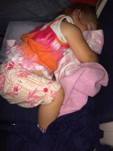 Abigail sleeping on plane